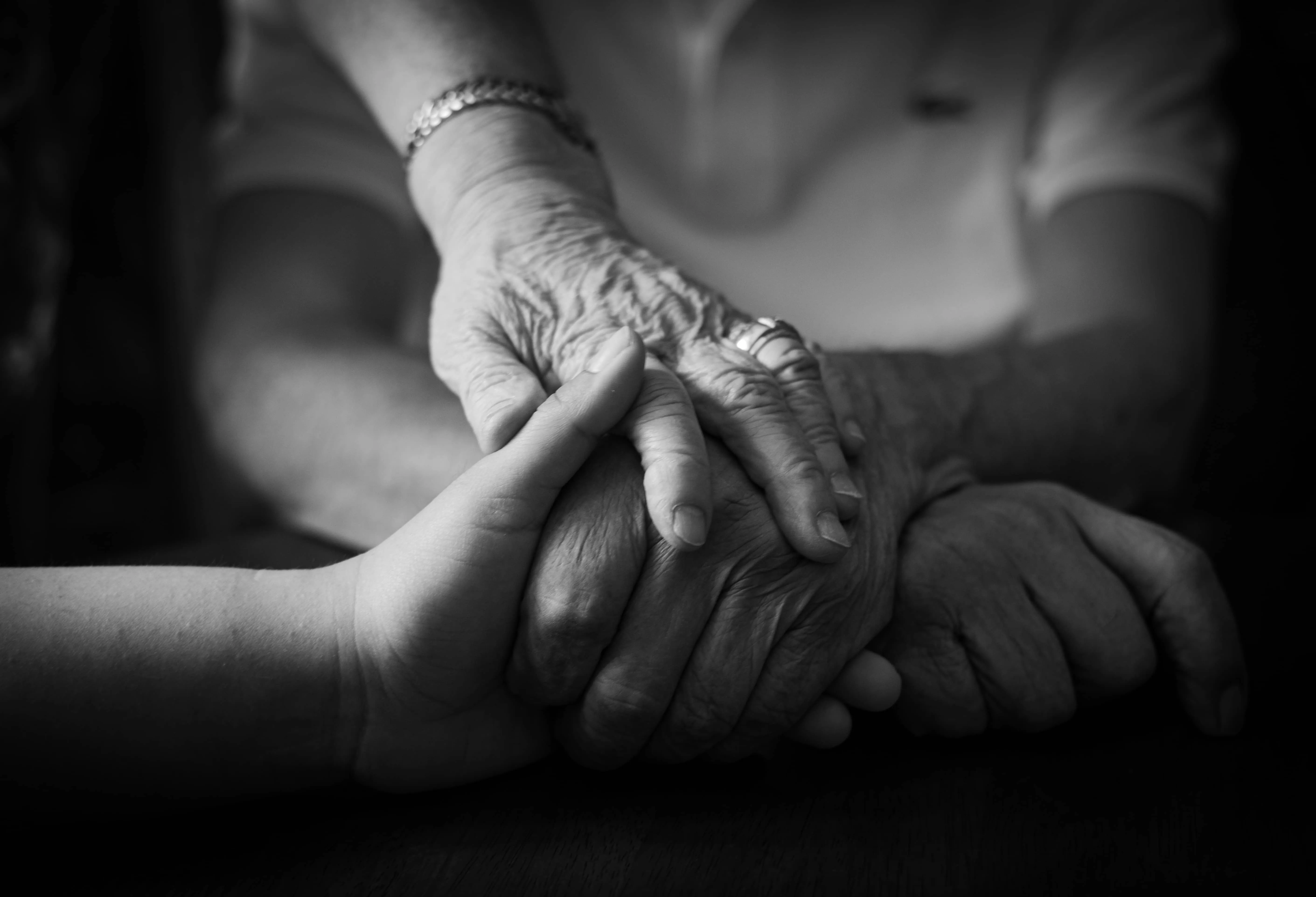 Two hands held gently together